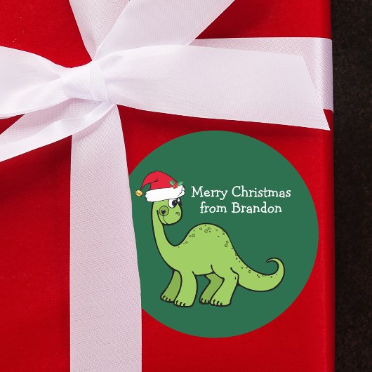 Niedlicher Dinosaurier in Weihnachtsmannmütze Kids Runder Aufkleber