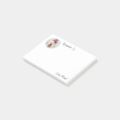 Niedlicher Fluffy Hund mit einer Katze auf seinem  Post-it Klebezettel (angewinkelt)