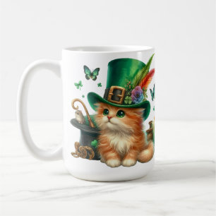 NIEDLICHER FLÜFFY KITTEN IM IRISCHEN HAT KAFFEETASSE