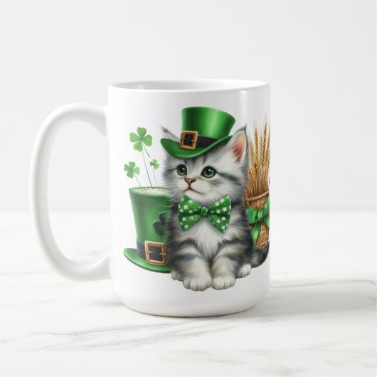 NIEDLICHER FLÜFFY KITTEN IM IRISCHEN HAT KAFFEETASSE (Links)