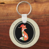 Niedlicher Fox in Weihnachtshut in einem schwarzen Schlüsselanhänger (Vorderseite)