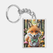 Niedlicher Fox mit einem grünen und rosa Bug Schlüsselanhänger (Vorderseite links)