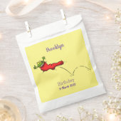 Niedlicher Frosch in einem roten Cartoon Geschenktütchen (Ausgeschnitten)