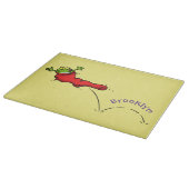 Niedlicher Frosch in einem roten Cartoon Schneidebrett (Ecke)