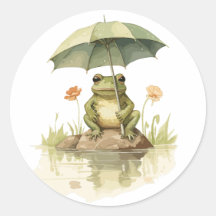 Niedlicher Frosch mit einem Regenschirm am See