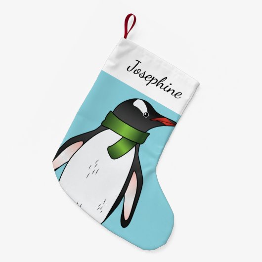 Niedlicher Gentoo Pinguin mit einem grünen Skarf a Kleiner Weihnachtsstrumpf (Vorderansicht (hängend))
