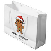 Niedlicher Gingerbrot Mann mit Weihnachtsmannmütze Große Geschenktüte (Vorderseite Schrägansicht)