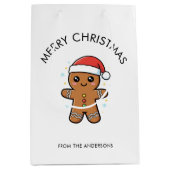 Niedlicher Gingerbrot Mann mit Weihnachtsmannmütze Mittlere Geschenktüte (Vorderseite)
