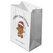 Niedlicher Gingerbrot Mann mit Weihnachtsmannmütze Mittlere Geschenktüte (Rückseite Schrägansicht)