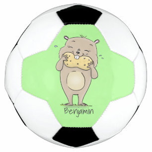 Niedlicher, glücklicher Hamster mit Erdnuss-Cartoo Fußball