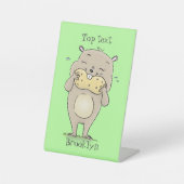 Niedlicher, glücklicher Hamster mit Erdnuss-Cartoo Sockelschild (Vorderseite)