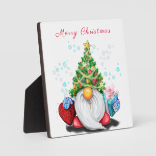 Niedlicher Gnom mit Weihnachtsbaumhut und Geschenk Fotoplatte