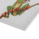Niedlicher grüner Baum-Frosch mit Augen-Gläsern Schneidebrett (Ecke)