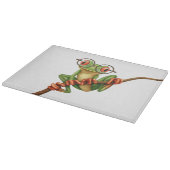 Niedlicher grüner Baum-Frosch mit Augen-Gläsern Schneidebrett (Ecke)