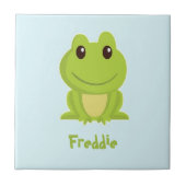 Niedlicher grüner Frosch auf blau Fliese (Vorderseite)