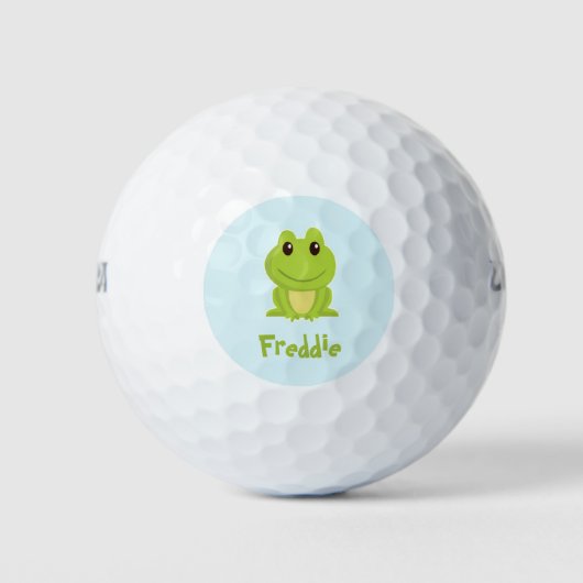 Niedlicher grüner Frosch auf blau Golfball (Vorderseite)