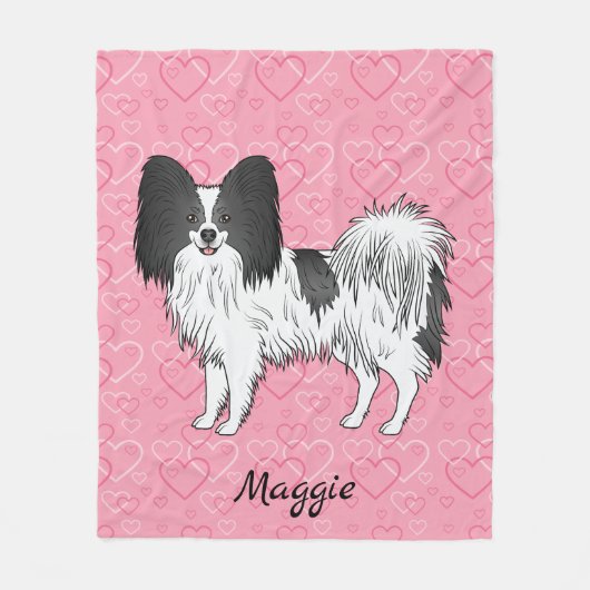 Niedlicher Hund aus schwarz-weißem Papillon auf ro Fleecedecke (Vorderseite)