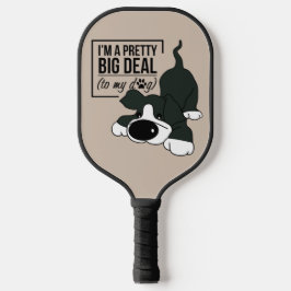 Niedlicher Hund je Pickleball Schläger