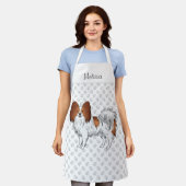 Niedlicher Hund mit Papillon, rot und weiß, mit b Schürze (Getragen)