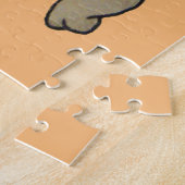 niedlicher Hund spielt braunen Mops Puzzle (Seite)