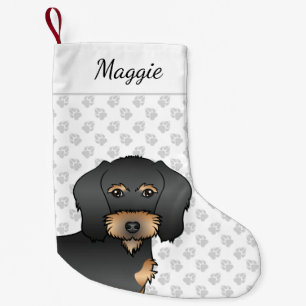 Niedlicher Hundekopf mit schwarzer und gelbeinhalt Kleiner Weihnachtsstrumpf
