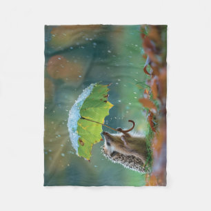 Niedlicher Igel mit einem Blattschirm Fleecedecke