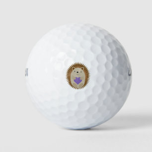 Niedlicher Igel umarmt ein Lila Herz Golfball