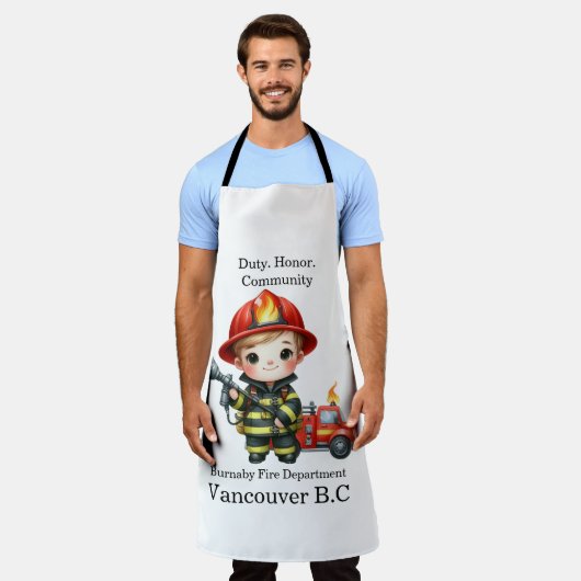 Niedlicher junger Feuerwehrmann mit rotem Fanggerä Schürze (Getragen)