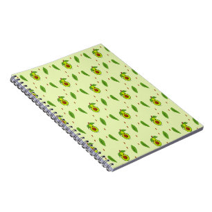 Niedlicher Kawaii-Avocado auf grüner Fläche Notizblock