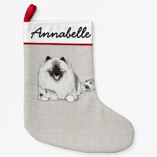 Niedlicher Keeshond Hund mit Welpen Keesie Holiday Kleiner Weihnachtsstrumpf