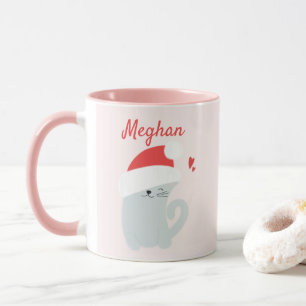 Niedlicher Kitty mit einer Tasse