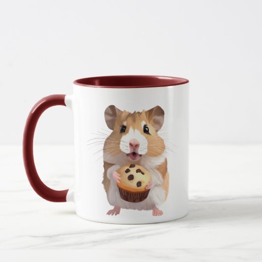 Niedlicher kleiner Hamster mit Muffin Tasse (Links)