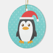 Niedlicher kleiner Penguin mit Weihnachtsmannmütze Keramikornament (Links)