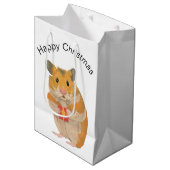 Niedlicher kleiner WeihnachtsHamster mit Geschenk Mittlere Geschenktüte (Vorderseite Schrägansicht)