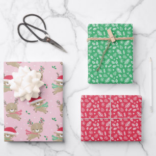 Niedlicher kleiner Weihnachtsmann auf rosa Geschenkpapier Set