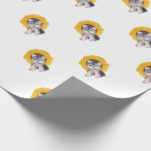 Niedlicher kleiner Yorkshire-Welpenhund und Sonnen Geschenkpapier (Ecke)