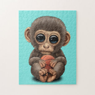 Niedlicher Kleinkind-Affe mit Basketball Puzzle