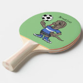 Niedlicher Komodo-Drache beim Fußballspielen Carto Tischtennis Schläger (Vorderseite)