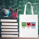 Niedlicher Lehrer Wiederverwendbare Einkaufstasche<br><div class="desc">Peace Liebe Lehrtüten. Diese sind ideal für die Lehrerbewertungswoche oder das Ende des Jahres,  um mit kleinen Geschenken aus der Klasse oder handgefertigten Karten der Schüler zu füllen. Ein Friedenszeichen,  ein Herz und ein roter Apfel.</div>