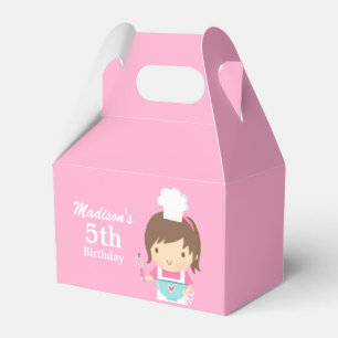 Niedlicher Mädchen-Koch, der Geschenkschachtel