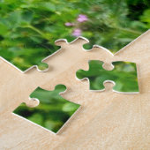 Niedlicher nigerianischer Zwergziegenkid mit blaue Puzzle (Seite)