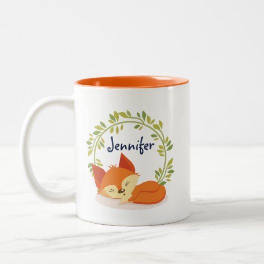 Niedlicher Orangenfox mit grünem Blätter Kranz Zweifarbige Tasse (Links)