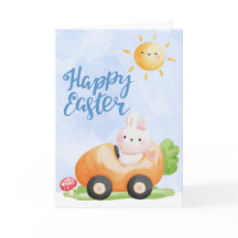 Niedlicher Osterhase in Karottenwagen