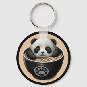 Niedlicher Panda-Bär, der in einer Schüssel Ramen Schlüsselanhänger