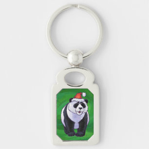 Niedlicher Panda-Bär in Weihnachtsmannmütze auf Gr Schlüsselanhänger