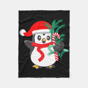 Niedlicher Pinguin, der ein Candy Cane Weihnachtst Fleecedecke