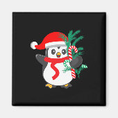 Niedlicher Pinguin, der ein Candy Cane Weihnachtst Magnet (Vorne)