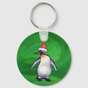 Niedlicher Pinguin in Weihnachtsmannmütze auf Gree Schlüsselanhänger