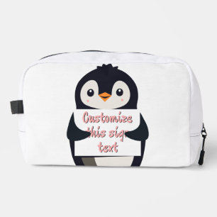 Niedlicher Pinguin mit einem Schild für personalis Waschbeutel