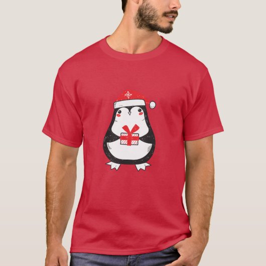 Niedlicher Pinguin mit Weihnachtsgeschenk T-Shirt (Vorderseite)